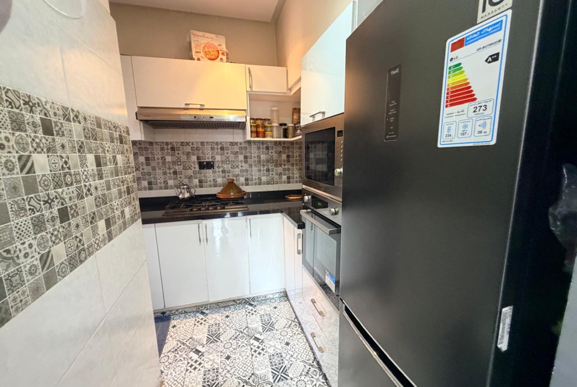 À Seulement 5 min de Guéliz – Maison de Ville avec Local Commercial à Vendre