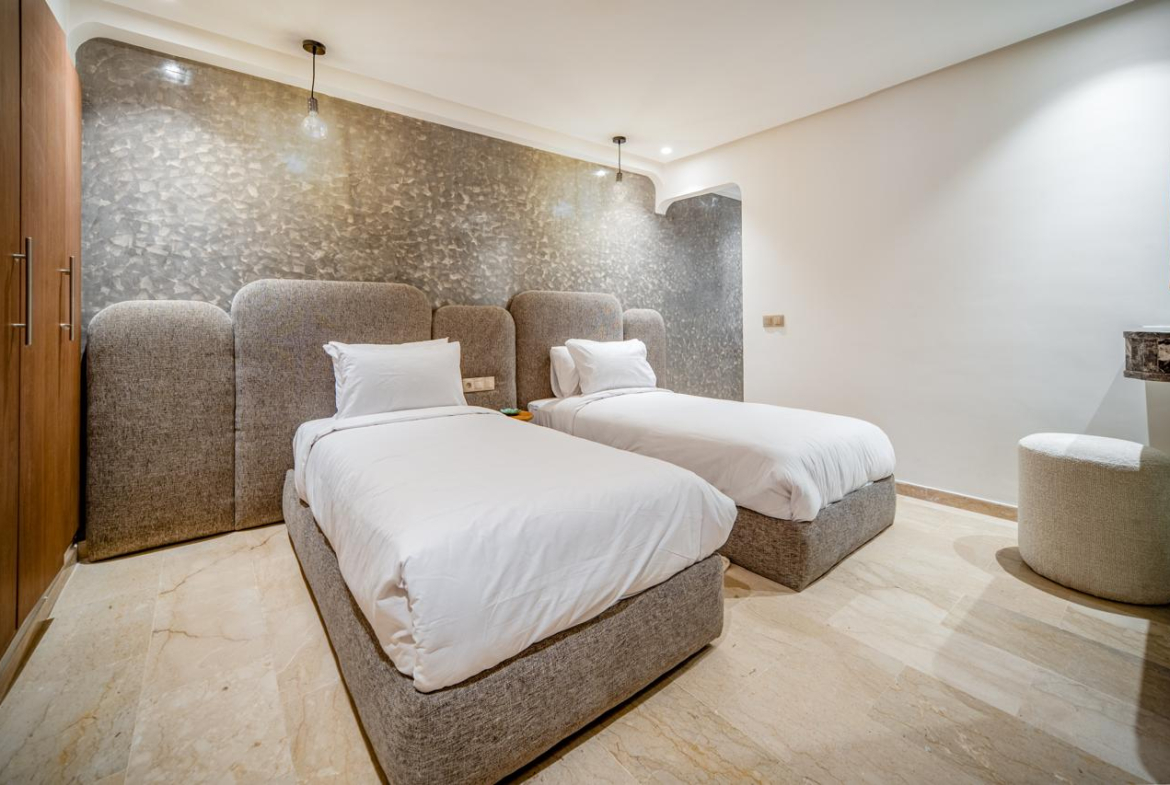 APPARTEMENT MEUBLÉ HAUT STANDING AVEC PISCINE ROOFTOP – À VENDRE/ GUELIZ