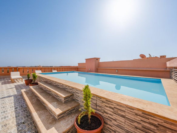 APPARTEMENT MEUBLÉ HAUT STANDING AVEC PISCINE ROOFTOP – À VENDRE/ GUELIZ