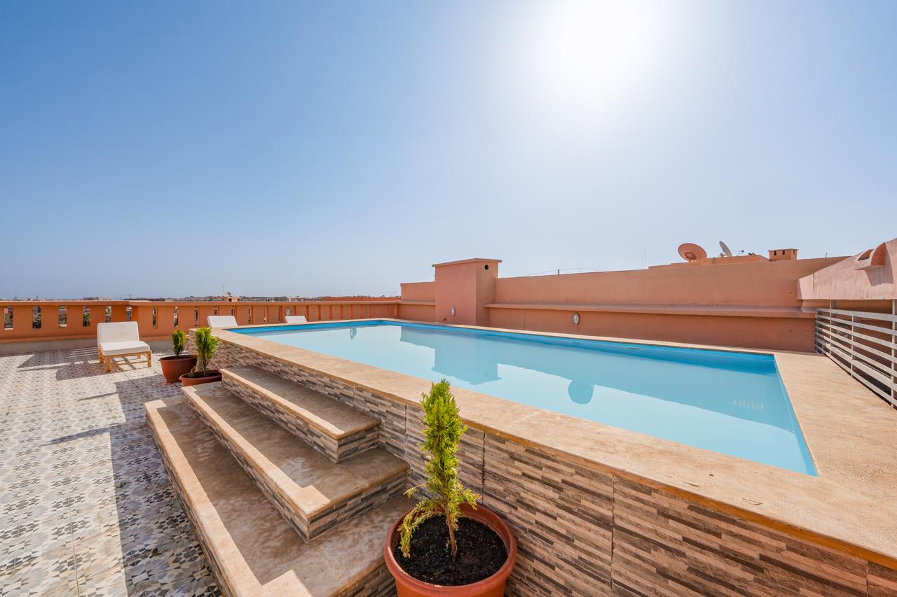 APPARTEMENT MEUBLÉ HAUT STANDING AVEC PISCINE ROOFTOP – À VENDRE/ GUELIZ